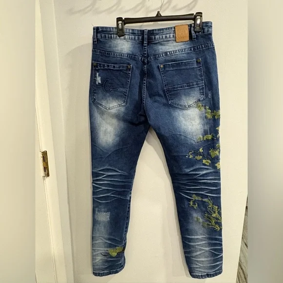 Stylish Blue Jeans with Olive Embroidered Accents - Picture 2 of 16